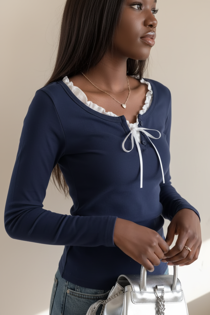 Customer wearing navy bow top